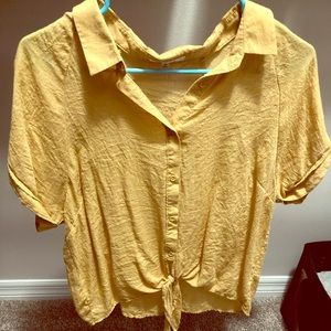 Yellow button down front tie shirt
